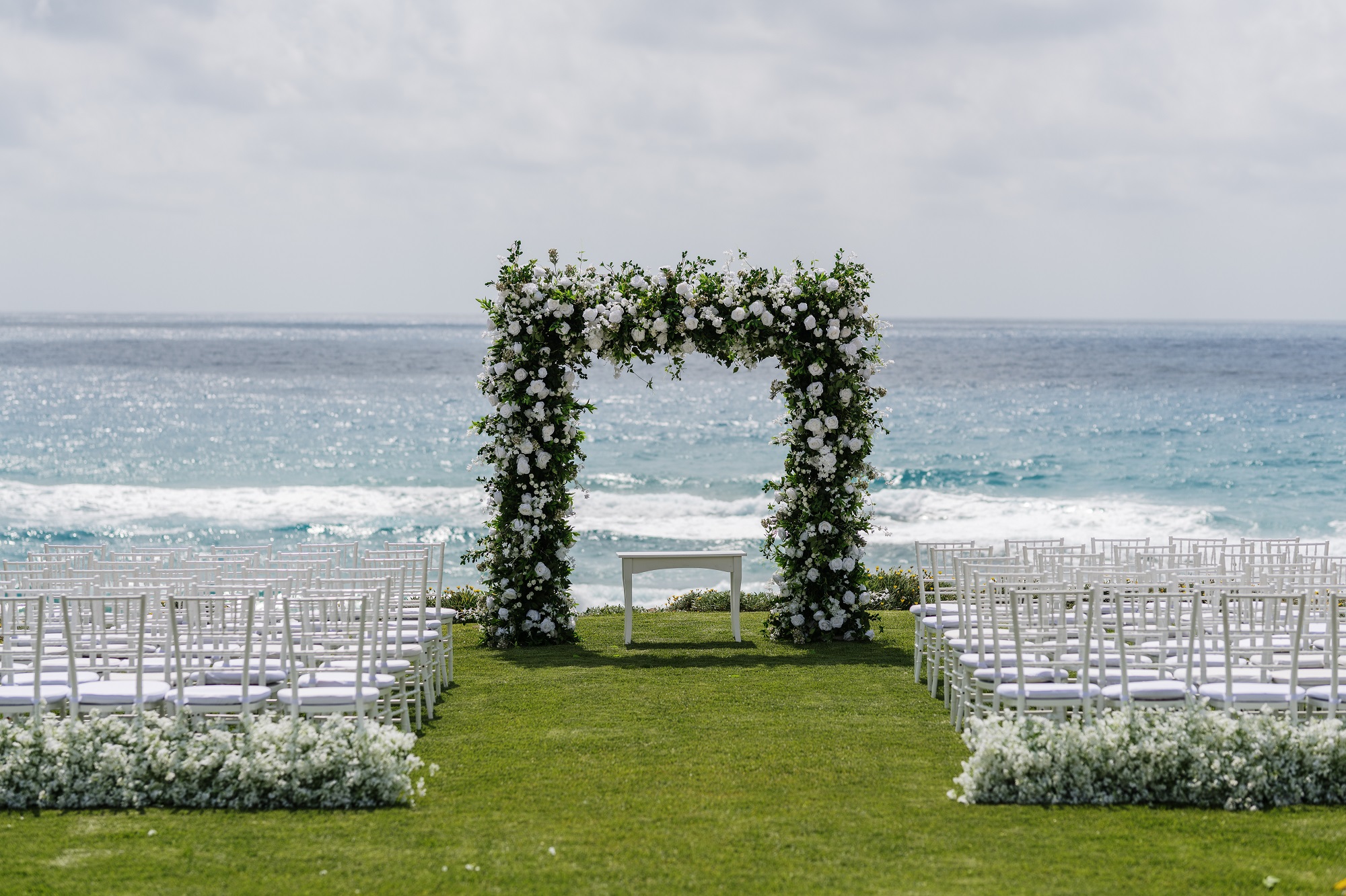 Luxury square wedding arch with fresh roses and greenery styling by Sofi Andreou